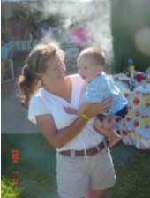 Me with 14 month old Tyler at a family reunion July 24, 2004.